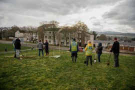 Image from the planting of The Dispersed Memorial Forest in The Crichton & NHS Mountainhall, Dumfries, Scotland.