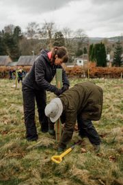 Image from the planting of The Dispersed Memorial Forest in The Crichton & NHS Mountainhall, Dumfries, Scotland.