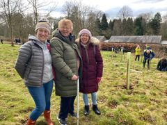 Image from the planting of The Dispersed Memorial Forest in The Crichton & NHS Mountainhall, Dumfries, Scotland.