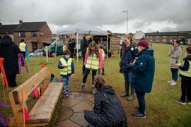Image from the launch of The Dispersed Memorial Forest at Bell Crecent Park, Sanquhar, on Friday, 14 June, 2024.